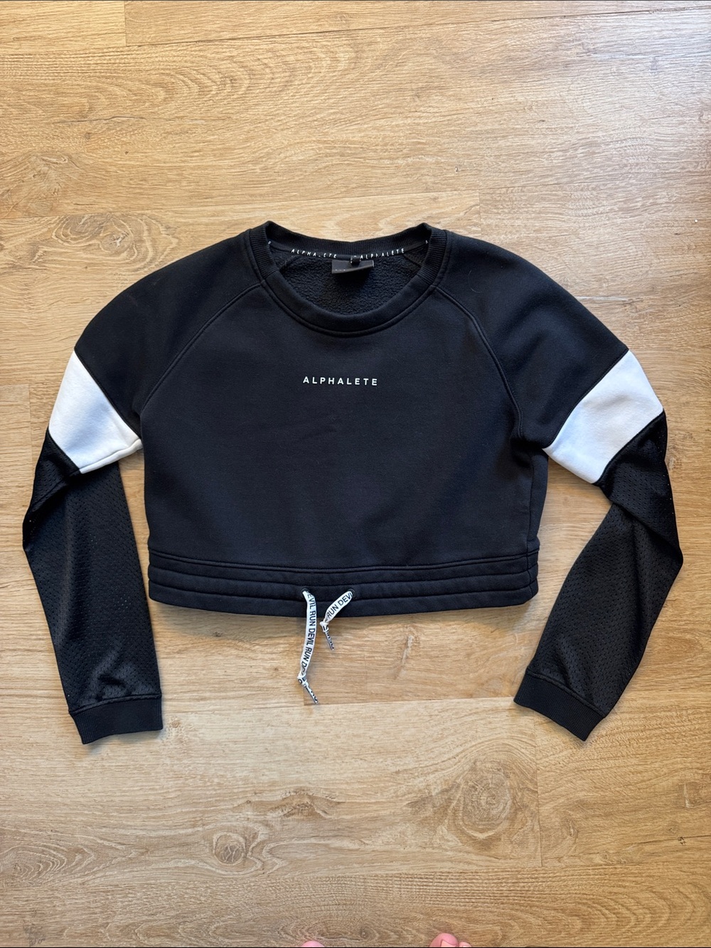 Alphalete Black Cropped Sweatshirt with White Sleeve Accents